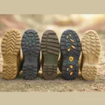 Suelas de cinco botas de trabajo diferentes alineadas, mostrando sus dibujos y funciones: antideslizante, dieléctrica, resistente al calor, antiperforación y de absorción de impactos.